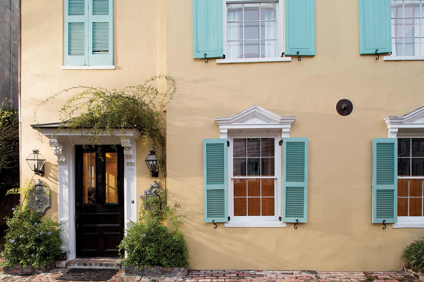 Yellow Exterior Black Door and Blue-Green Shutters - PaintPlace New York